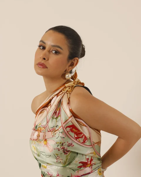 Meadow Poem floral halter, cropped above the trousers