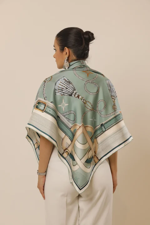 Mint Reverie draped across the shoulders from behind, showing its complete pattern